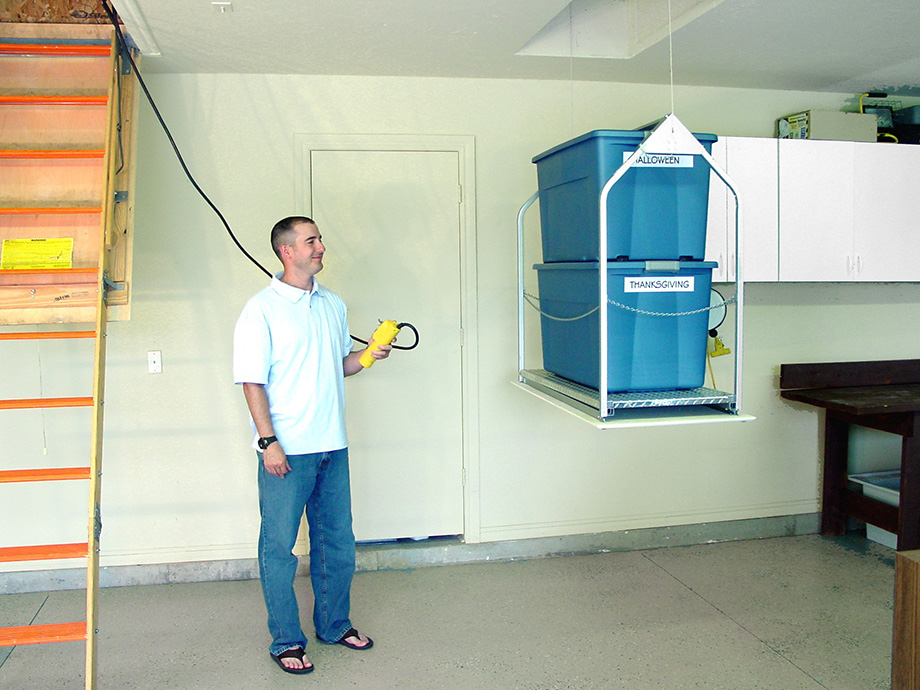 Attic lift by GARAGE STORAGE SOLUTIONS.